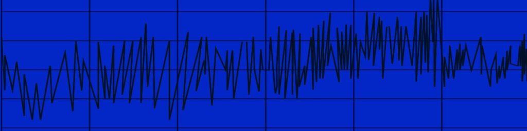 A snapshot of a noisy line graph going up and down